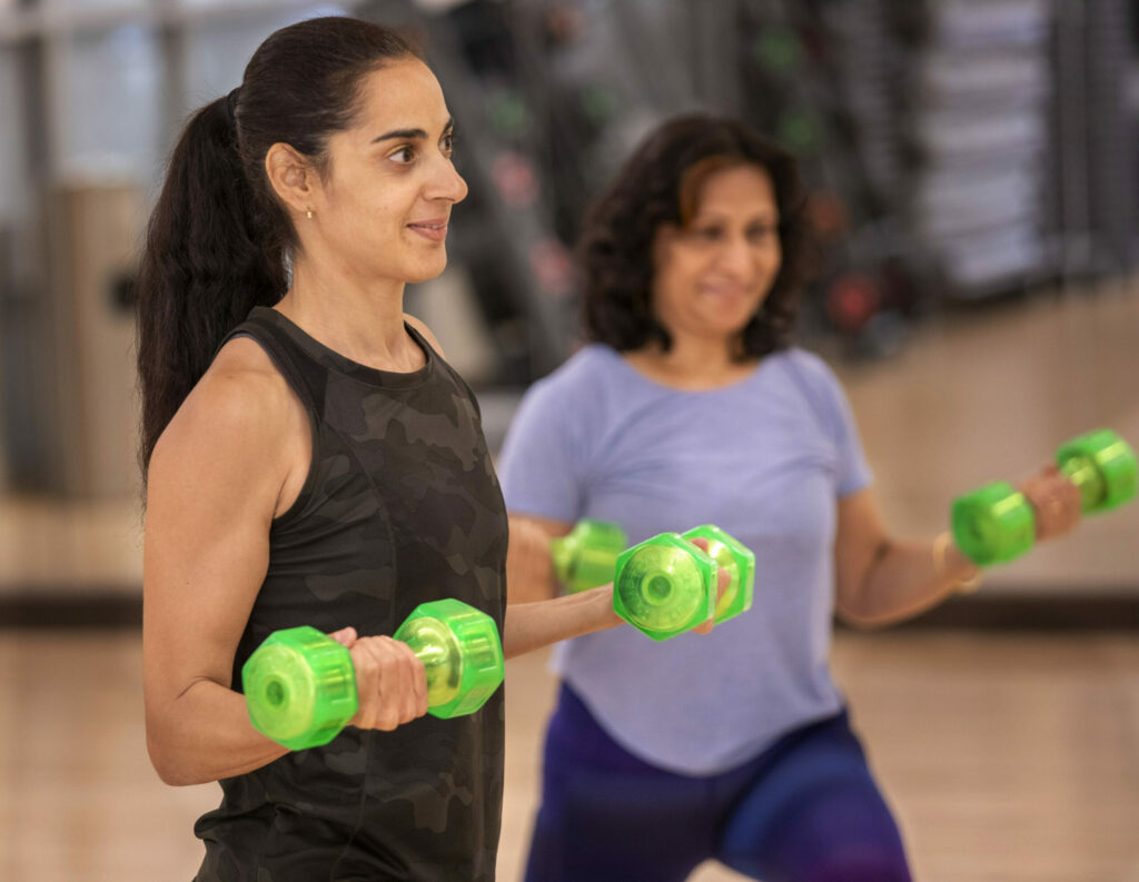 women in group fitness classes