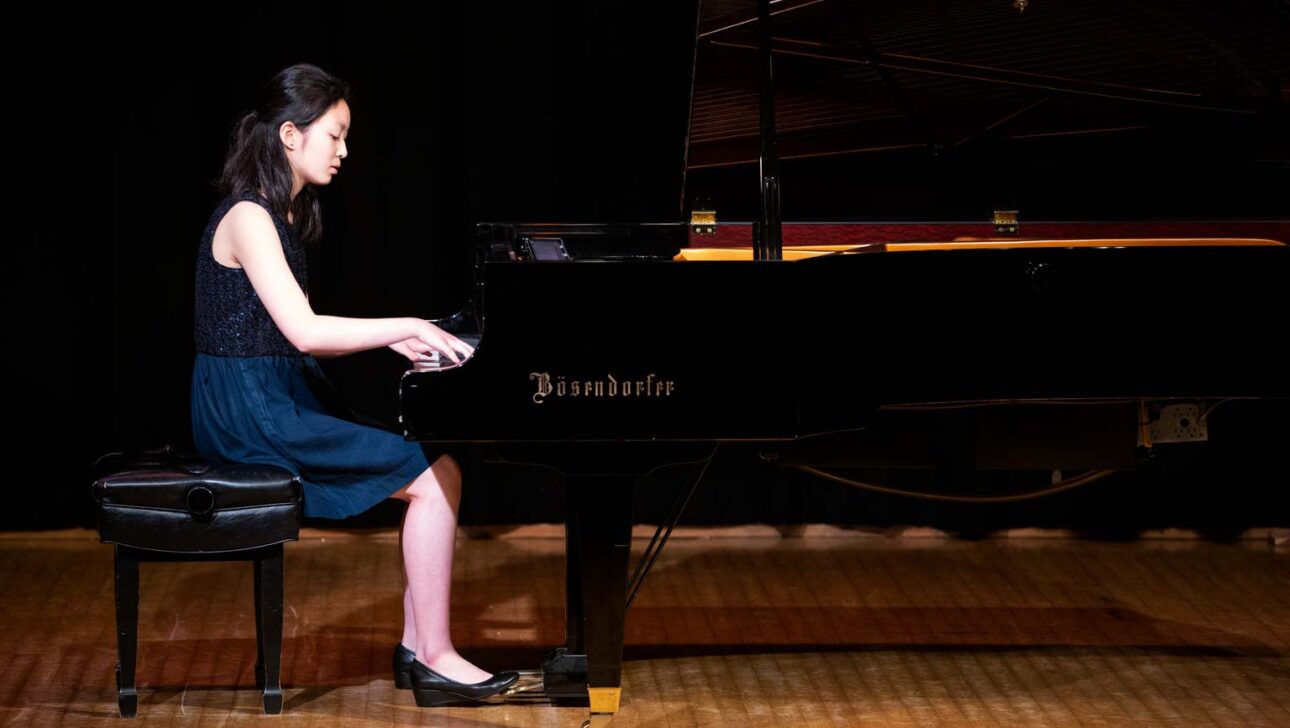 Girl playing the piano.