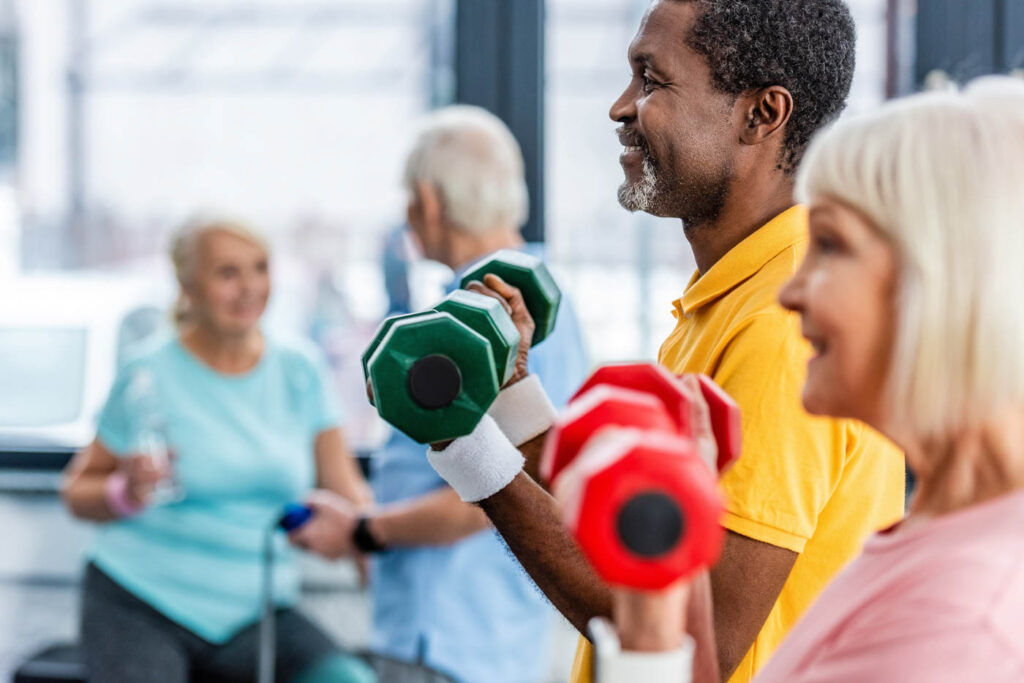 Seniors in a weight exercise class.