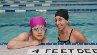 Swim instructor and student in the pool.