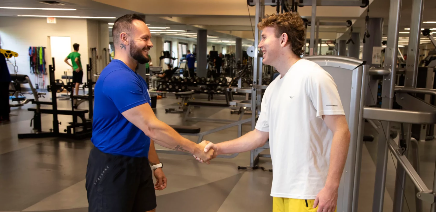 Personal Trainer welcoming a student at Kaplen JCC on the Palisades